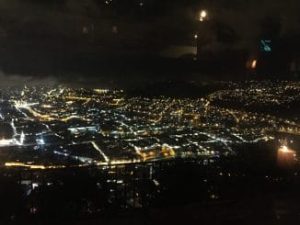 City lights of Quito, Ecuador seen from above at night.